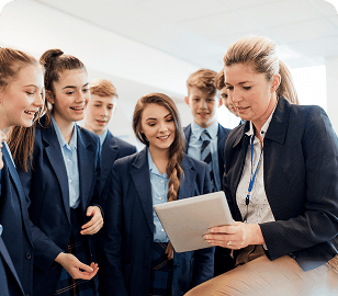 Teacher reviewing documents with students