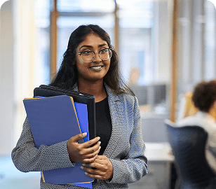 Professional woman holding folders